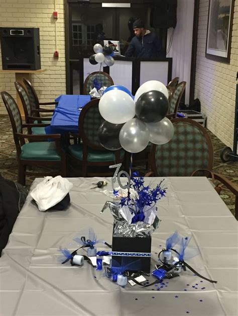 We've gathered some great 70th birthday party ideas to celebrate this special day: 70th birthday centerpieces blue black white and silver ...