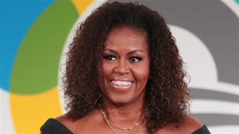 michelle obama s natural curls have a new hair color — photo allure