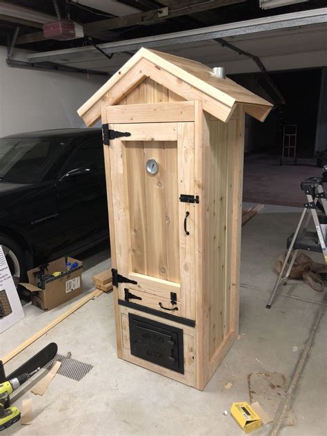 I provide a material list and. Homemade smokehouse. DIY smoker built with a bypass ...