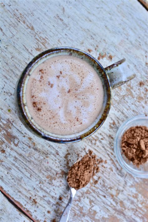 hot chocolate with coconut whipped cream oh yes it is the perfect time of the year for hot
