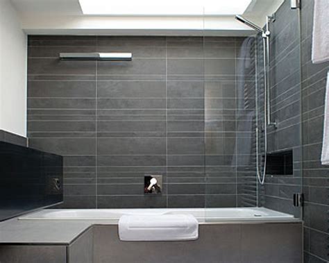 Larger tiles make your bathroom look bigger and that's why our designers recommend sticking on the monochromatic look throughout the space can look amazing in any modern or contemporary. 32 good ideas and pictures of modern bathroom tiles ...