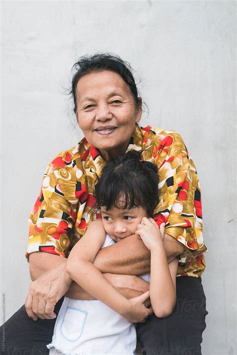 Asian Grandmother And Her Granddaughter By Stocksy Contributor Chalit Saphaphak Stocksy