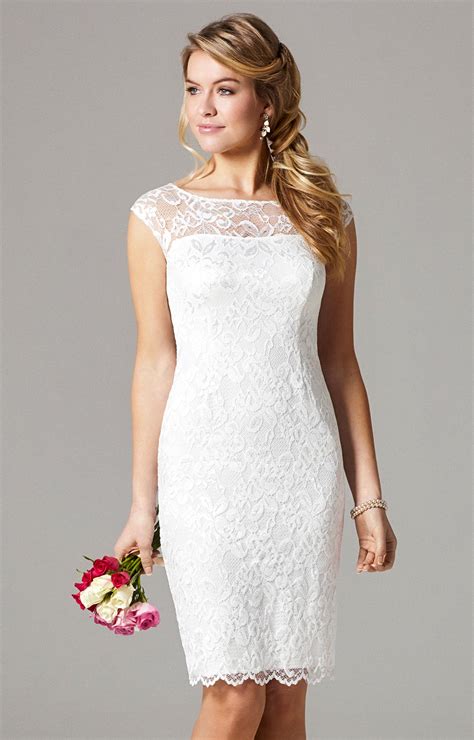 Halter styles are beautiful on a shorter designer wedding gown, as it adds more interest. Short ivory lace wedding dress - IAMMRFOSTER.COM