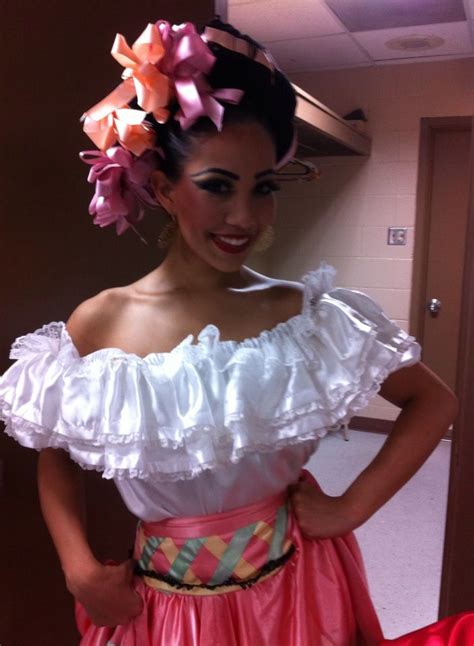 a leyenda dancer posing right before entering stage ballet folklorico shows