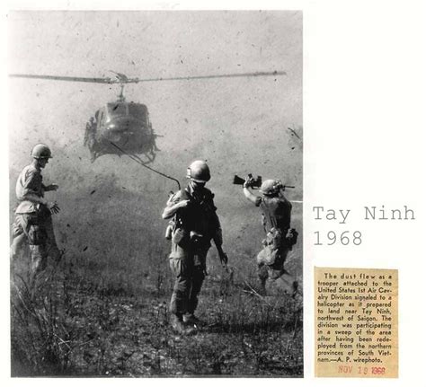 1968 1st Air Cav Soldier Signals Helicopter Landing At Tay Ninh