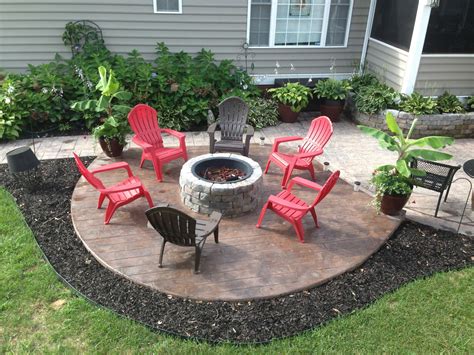 Shop top quality concrete, cement, & gfrc fire pits, fire tables, & fire bowls. New Stamped concrete Patio with built in fire pit. What a great addition to this already ...