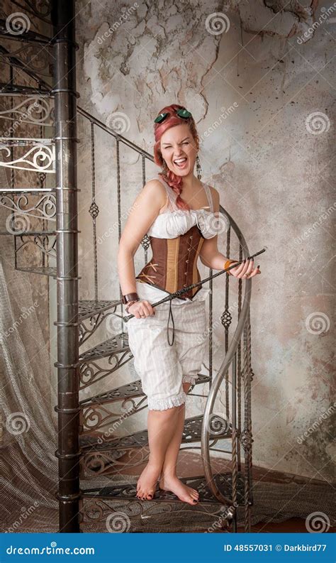 Beautiful Screaming Steampunk Woman With Whip On The Stairway Stock