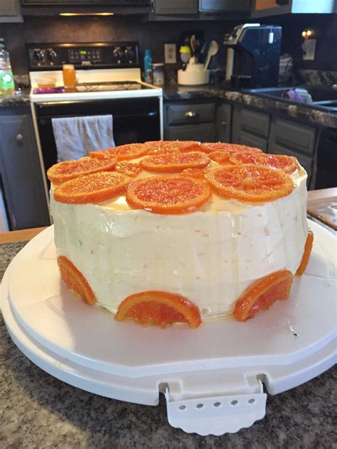 Fresh Orange Cake With Cream Cheese And Orange Frosting Topped With