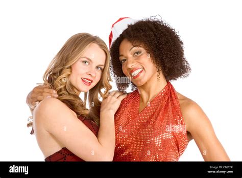 two lesbian friend lovers female one caucasian and second ethnic latina in mrs santa claus are