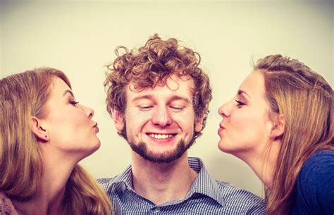 Two Pretty Young Women Kissing Handsome Man Stock Image Image Of Sharing Expression 76029815