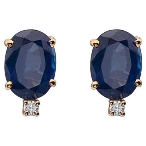 Birthstone Earrings Featuring Blueberry Tanzanite Nude Diamonds Set In