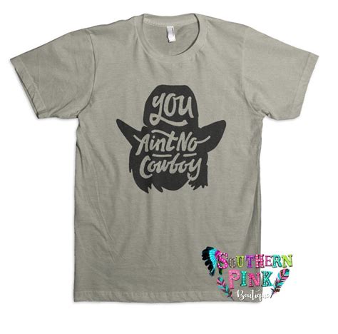 Discover the latest fashion trends in western shirts for women. Dale Brisby's You Ain't No Cowboy Tee | Dale brisby, Best t shirt brands