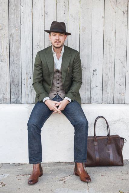 When it comes to styling, you can wear this brown chelsea casual boot with denim jeans. With white shirt, vest, olive green jacket, jeans, hat and big bag | Mens outfits, Chelsea boots ...