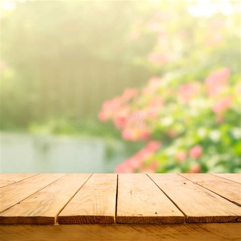 Empty Wood Table Top On Blur Abstract Garden And House Background Stock