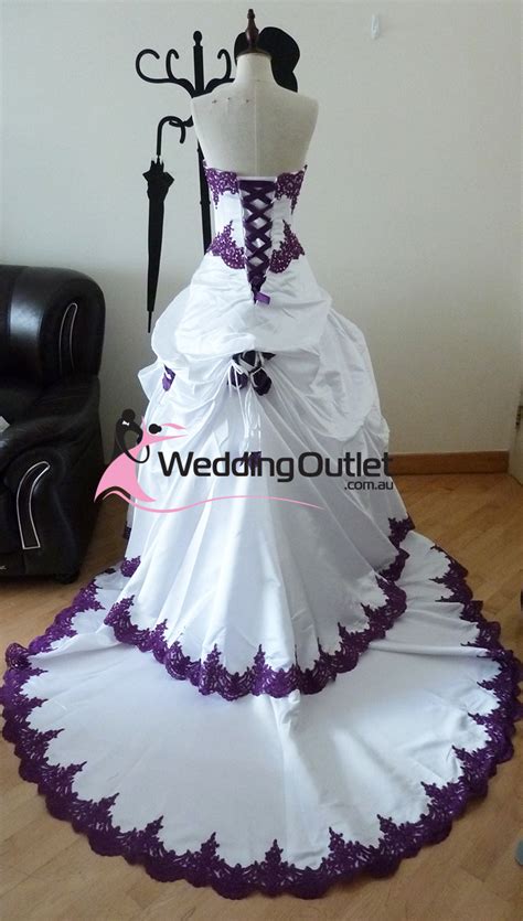 Creative corsets in victorian fashion have lots of striking nuances, such as cushion buttons or effective twigs. Scarlett Purple and White Wedding Dress - WeddingOutlet.com.au