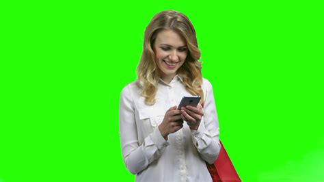 Pretty woman texting message on smartphone. Woman using ...
