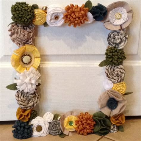 Fabric And Felt Flowers On An Old Frame Make A Great Spring