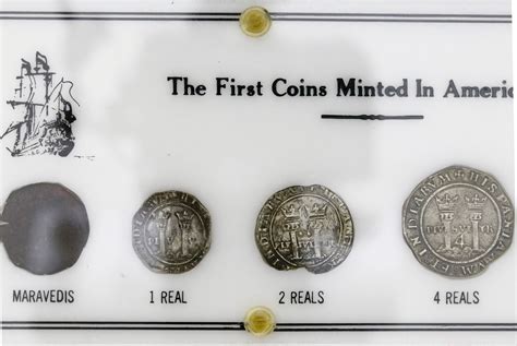 Four Coin Denomination Set In Holder Printed With The First Coins