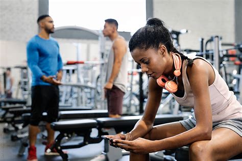 Fitness Woman Resting In The Gym By Stocksy Contributor Santi Nuñez