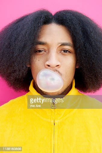 Man Blowing Bubble With Bubble Gum High Res Stock Photo Getty Images