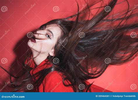 Crazy Girl Waving Her Hair Woman With Stylish Makeup And Long Hair