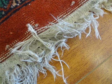 A hypnotizing print in navy blue contrasting with a cream base constitutes an interesting composition bound to attract attention and improve the looks of the nearest environment. Rug Master: Fringe Tassel Rug Repair at Los Angeles Rug ...
