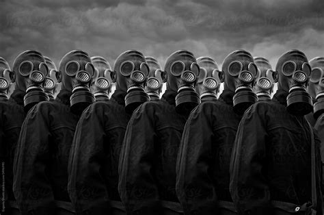 A Group Of Soldiers In Gas Masks By Stocksy Contributor Evgeniy
