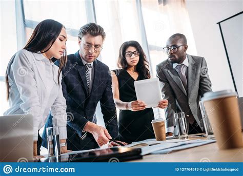 Multicultural Young Business People Having Business Meeting Stock Image