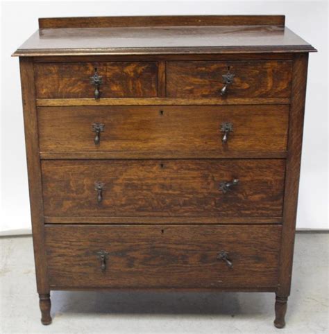 The sadie chest of drawers has an unusual finish. A 1930s oak chest of drawers, two short over three long ...