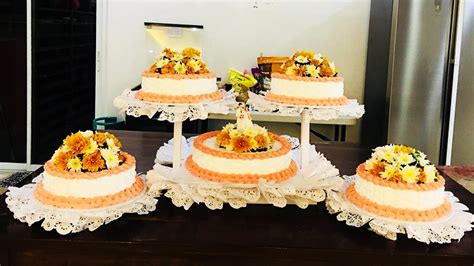 Vanilla chiffon cake with piped white boiled icing and royal icing flowers. YUFI'S CAKE DESIGN COMPILATION USING BOILED ICING | PART 2 ...