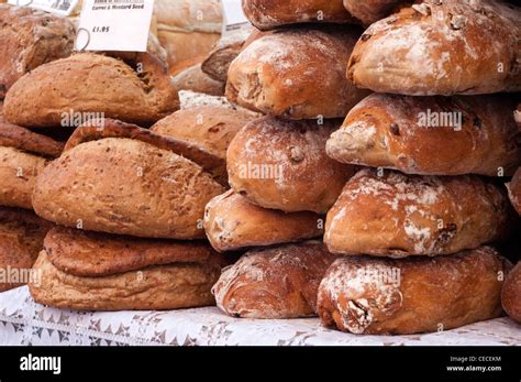 Loaves Of Fresh Bread Stacked At A Market Stock Photo Alamy