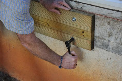 Ledger Board Attachment To A Solid Concrete Foundation Wall