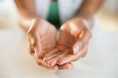 Womans Hands Cupped Stock Photo Dissolve