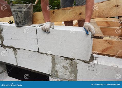 Bricklayer Builder Laying Autoclaved Aerated Concrete Blocks Aac For