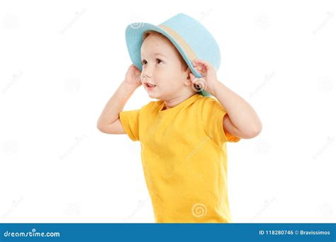 Little Boy Children In T Shirt And Hat Is Dancing On White Stock Photo