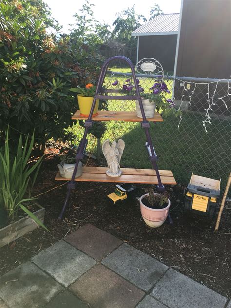 Repurpose Of An Old Pool Ladder Pool Ladder Garden Art Diy