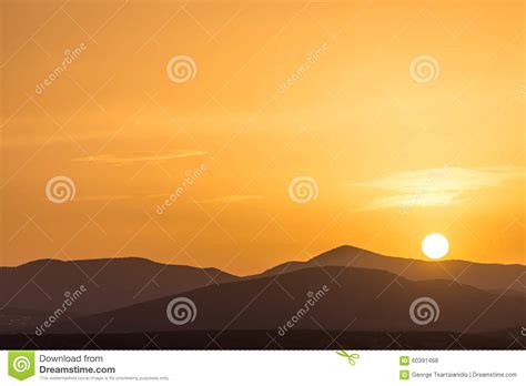 Scenic View Of A Beautiful Rich Orange Sunset Stock Photo Image Of