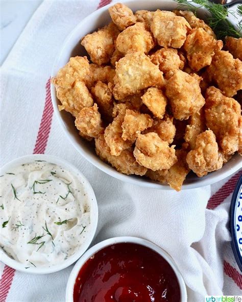 Place the corn flakes, salt, pepper, garlic powder, and smoked paprika into a large bowl. Air Fryer Popcorn Chicken | Recipe | Air fryer dinner ...