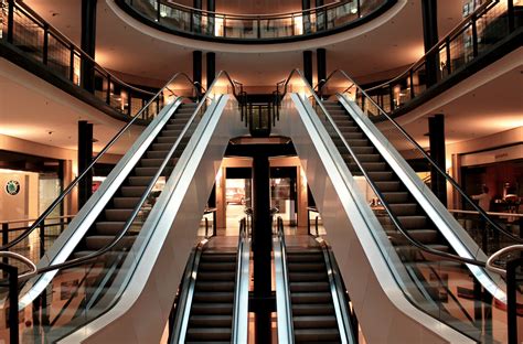 In addition to having just about every shop you could ever want, the mall also has unique attractions such as an indoor skydiving centre and a flowriding venue. Free Images : escalator, interior design, symmetry, lobby ...