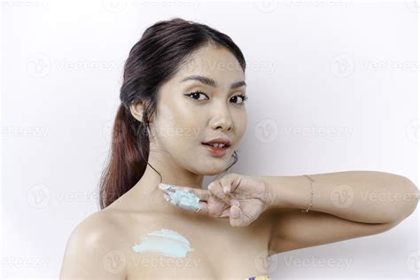 Skin Care Products Concept Asian Woman Applying Moisturizing Lotion On Body After Shower