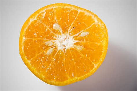 Slice Of Fresh Pile Orange Fruit With Seed For Healthy Diet Concept