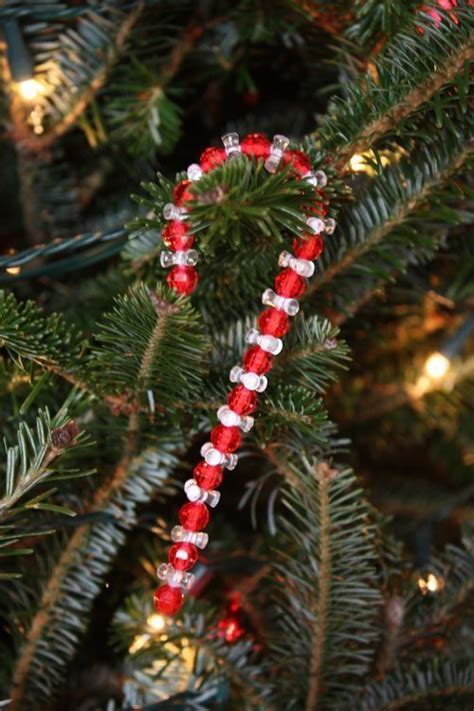 A fun and easy holiday craft for all ages, this candy cane ornament is a festive homemade piece perfect for any christmas tree! Pin by Fancy Shoe Queen 3 on Candy Cane Corners ...