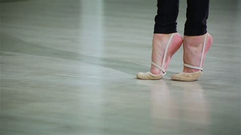Close Up Feet Of Ballerina In Pointe Performs Dance Ballet Elements And