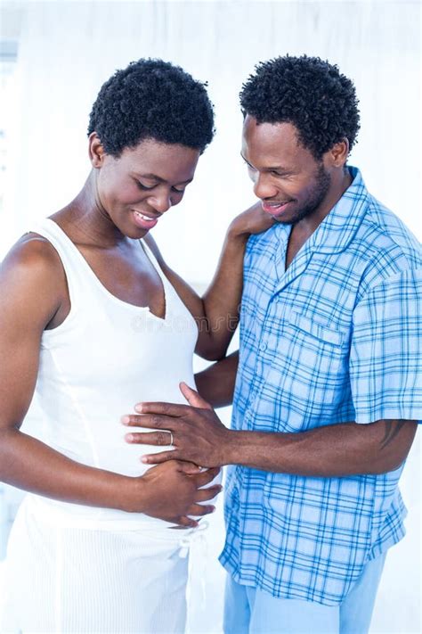 happy husband touching belly of pregnant wife stock image image of father happiness 60535163