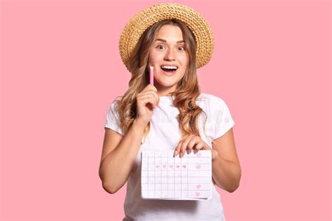 Positive Caucasian Young Woman Holds Periods Calendar Colourful Marker