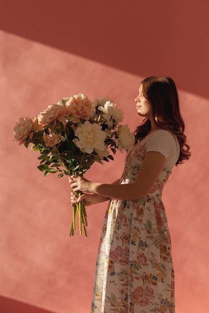 Free Photo Elegant Beautiful Woman Holding Flower Bouquet