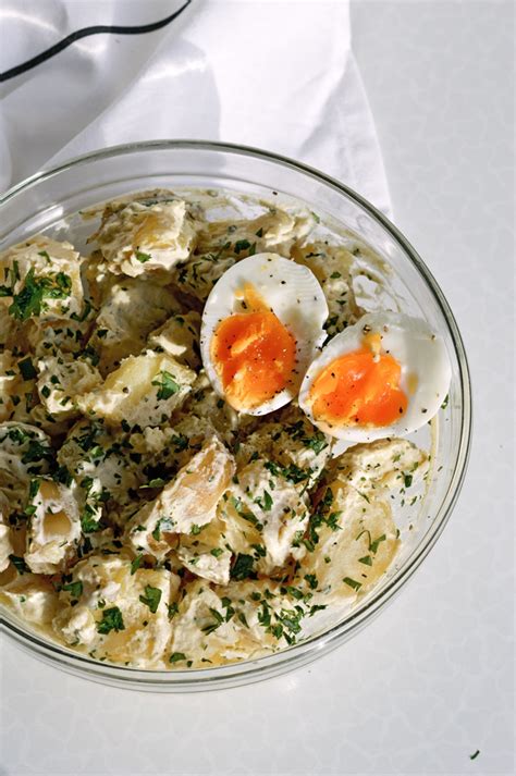 A sour cream dressing turns a basic potato salad recipe into something special for your next summer cookout. Mustard sour cream potato salad with parsley - Sugar Salted