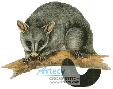 The sample is stitched in variegated gold, burnt orange, tan, and black. Brush Tail Possum Cross Stitch Pattern http://www ...