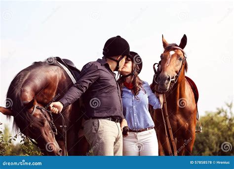 Happy Couple With Two Horses Stock Photo Image Of Horseback Cheerful