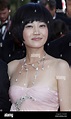 Actress Tan Zhuo arrives on the red carpet before the closing ceremony ...
